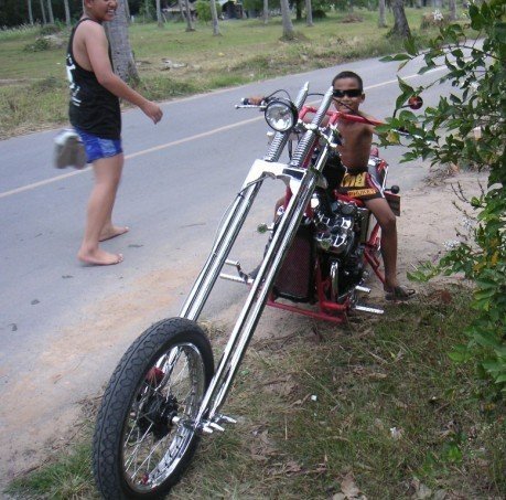 Daniel's Thai chopper with little Ombak aboard