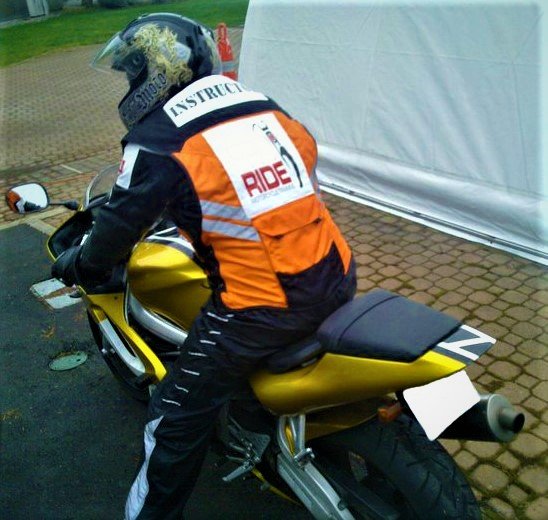Daniel teaching students on his sport bike